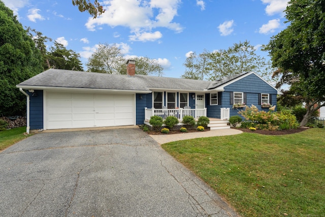 ranch-style house with driveway, a chimney, an attached garage, a porch, and a front lawn