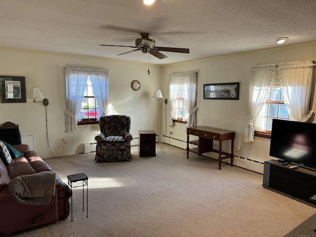 living room with carpet flooring, a baseboard radiator, and a textured ceiling