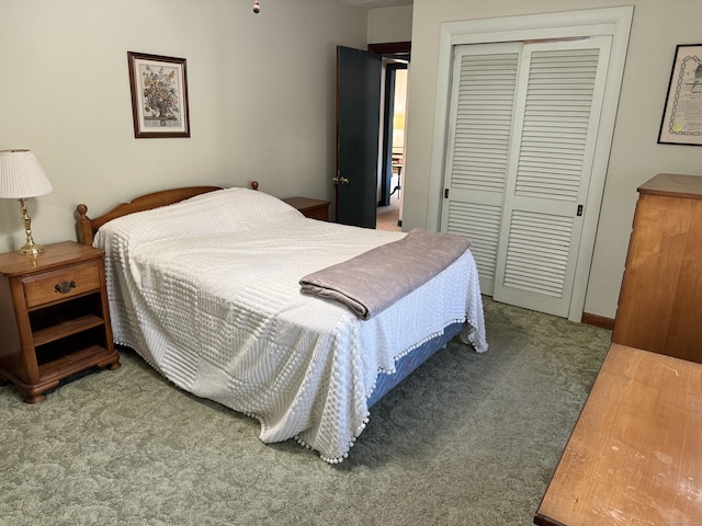 carpeted bedroom with a closet