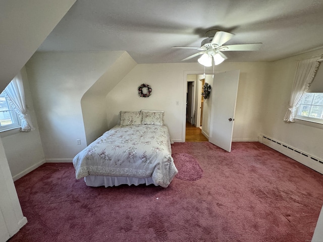 bedroom featuring carpet, ceiling fan, and a baseboard radiator