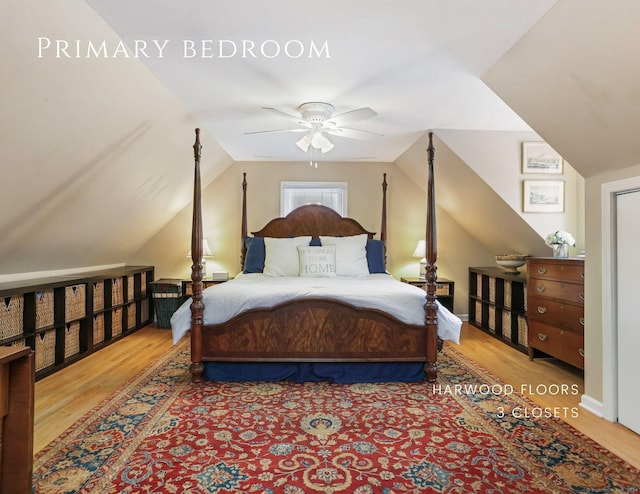 bedroom with hardwood / wood-style floors, vaulted ceiling, and ceiling fan