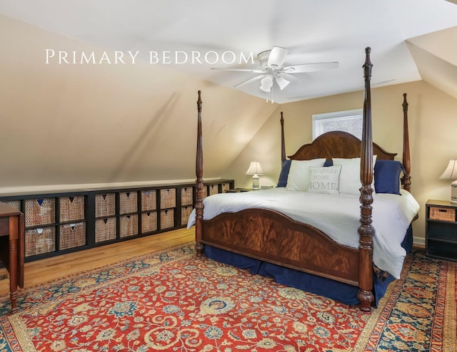 bedroom with wood-type flooring, ceiling fan, and lofted ceiling