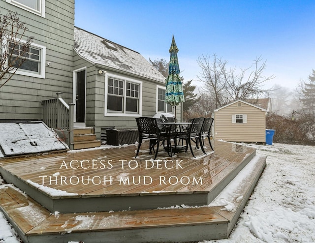 snow covered deck with central AC