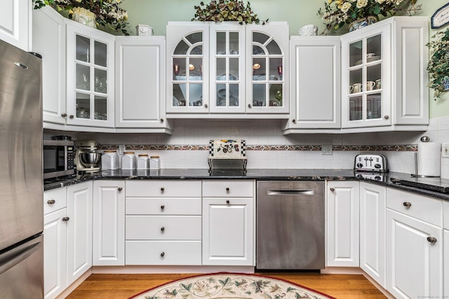 kitchen with white cabinets and stainless steel appliances