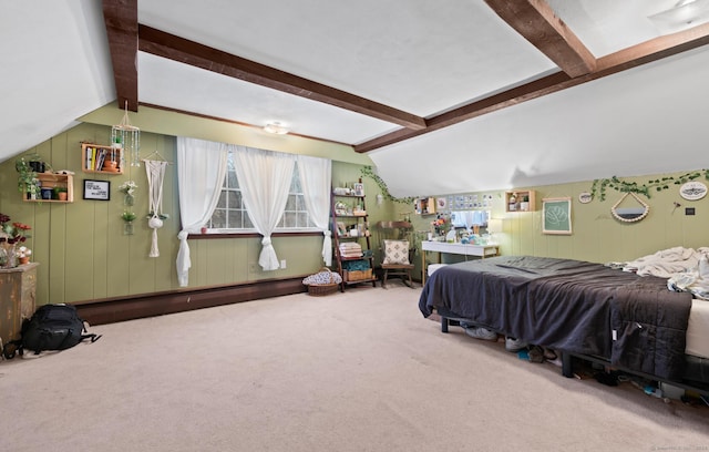 bedroom featuring carpet, vaulted ceiling with beams, and a baseboard radiator