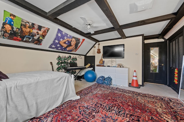 carpeted bedroom featuring beam ceiling, ceiling fan, and coffered ceiling