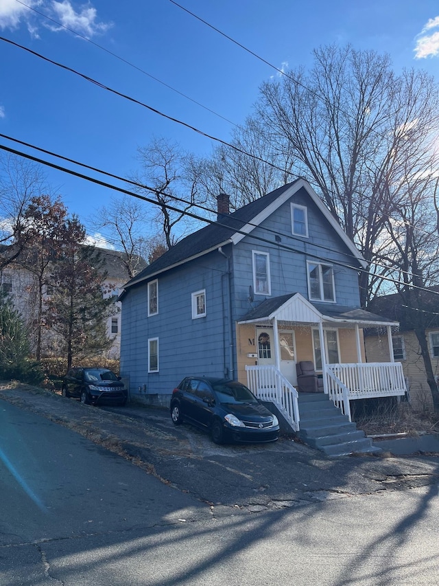 view of front of home featuring covered porch