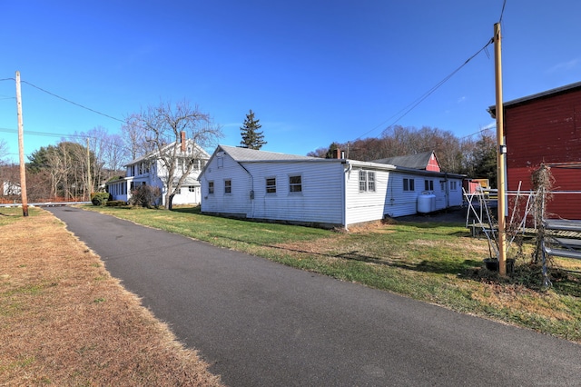 exterior space with a yard