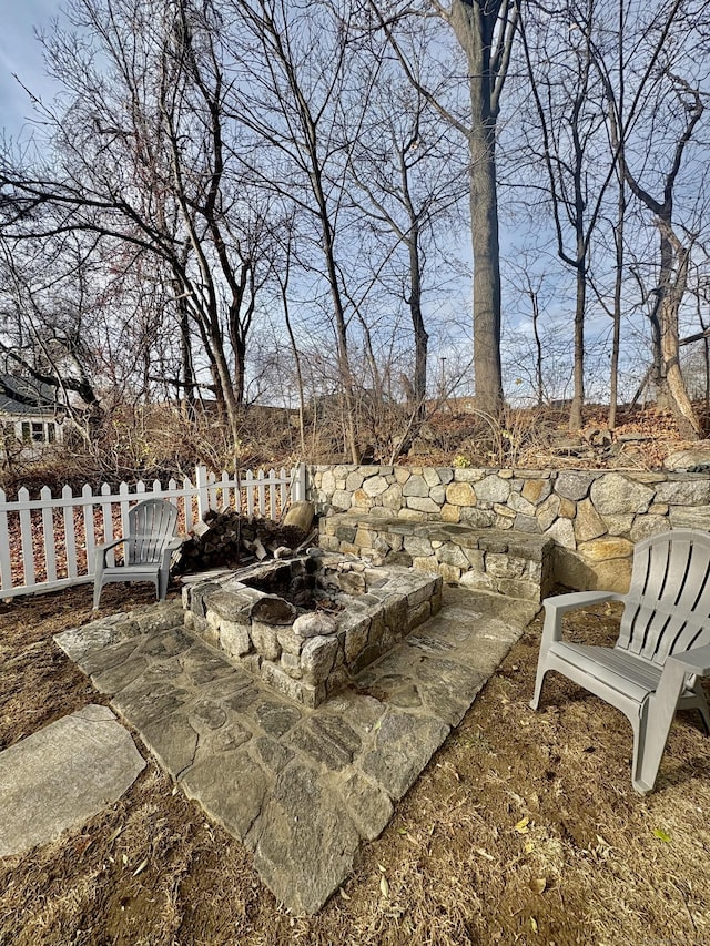 view of yard with an outdoor fire pit