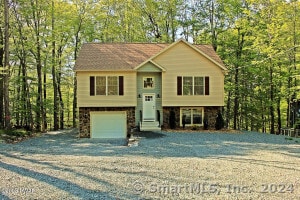 raised ranch with a garage