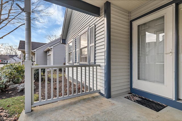 doorway to property with a porch