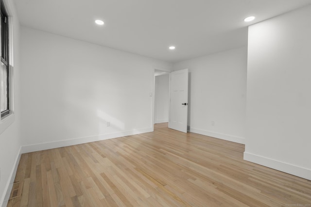 empty room featuring light hardwood / wood-style floors