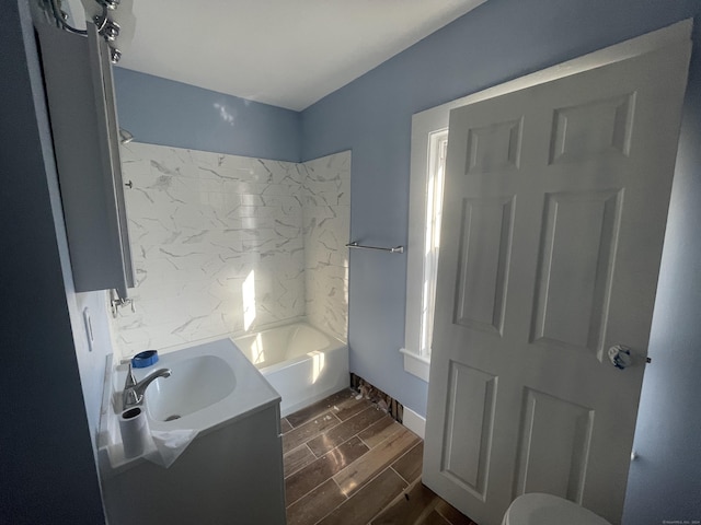 bathroom featuring vanity and bathing tub / shower combination