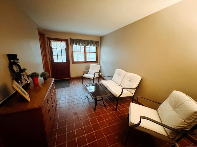 living area with dark tile patterned flooring