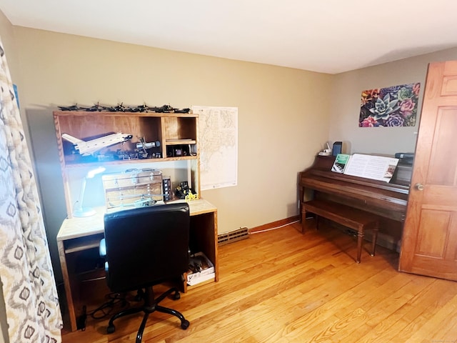 office space with light wood-type flooring