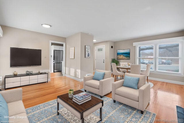 living room with wood-type flooring