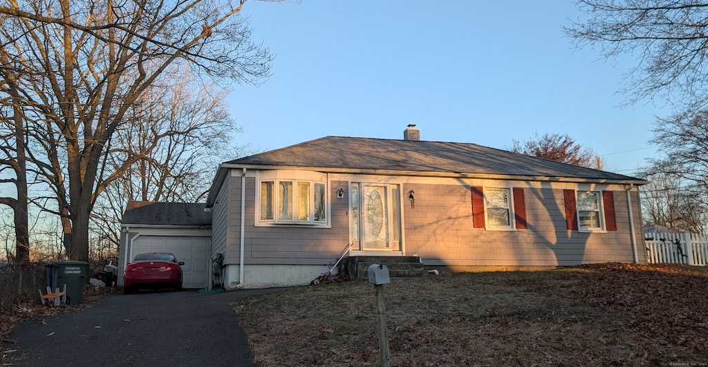 view of front of property featuring a garage