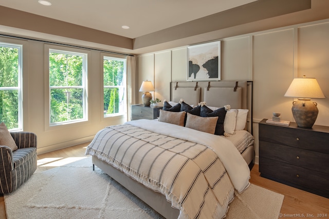 bedroom with light wood-type flooring