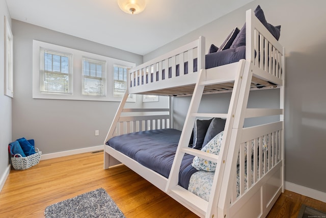 bedroom with hardwood / wood-style floors