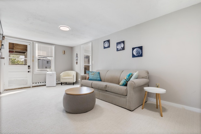 living room featuring carpet flooring and a baseboard radiator