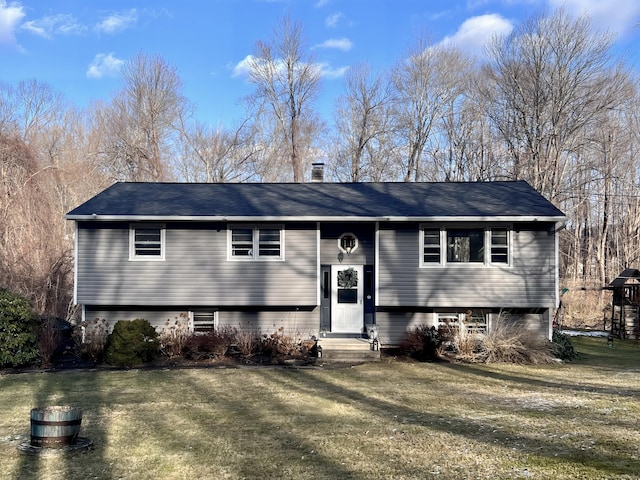 bi-level home featuring a front yard