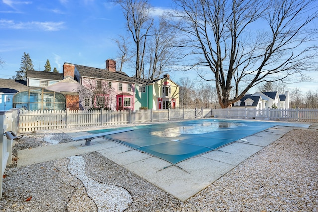 view of pool with fence private yard and a fenced in pool