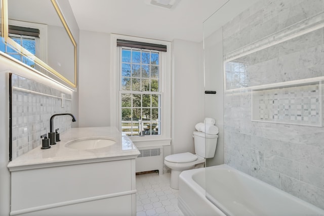 bathroom with radiator, visible vents, toilet, and vanity