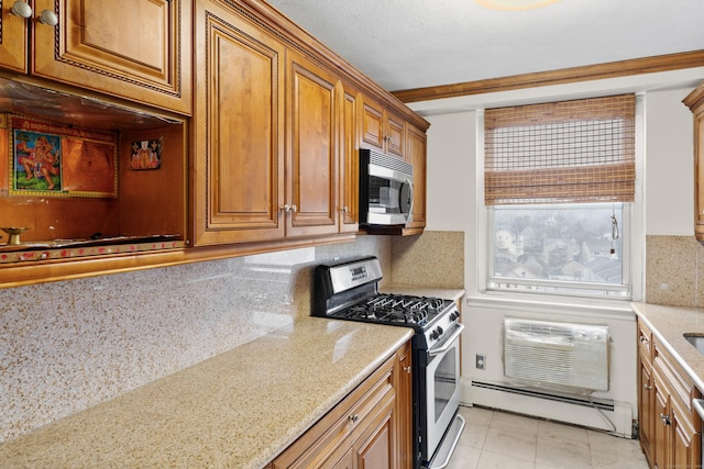 kitchen with decorative backsplash, light stone countertops, a baseboard radiator, stainless steel appliances, and a wall unit AC