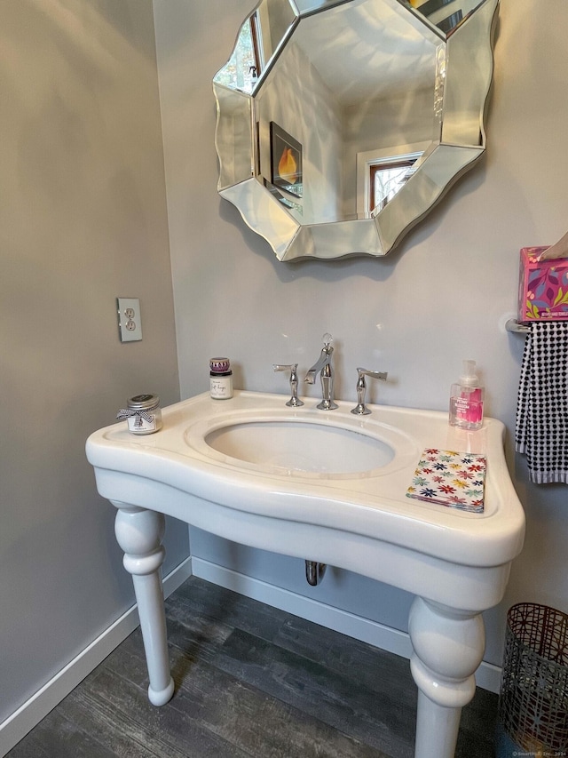 bathroom featuring hardwood / wood-style floors and sink