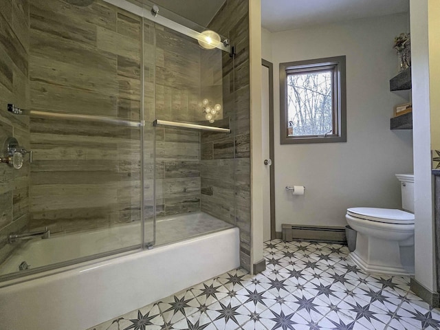 bathroom with combined bath / shower with glass door, toilet, and a baseboard radiator