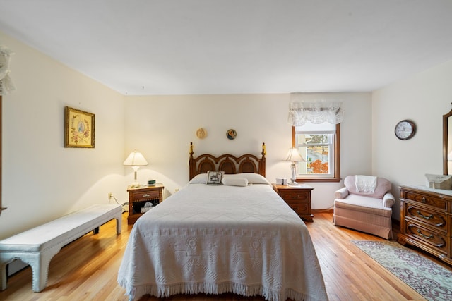 bedroom with light hardwood / wood-style flooring