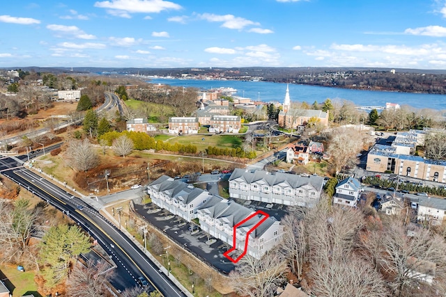 drone / aerial view featuring a water view