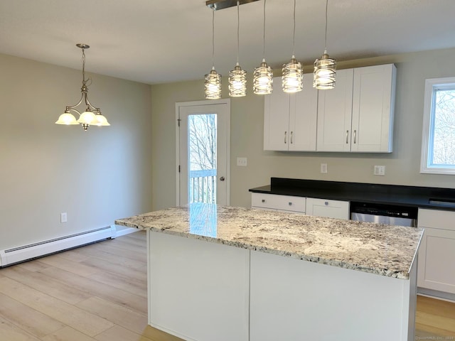 kitchen featuring pendant lighting, white cabinetry, light hardwood / wood-style flooring, and baseboard heating