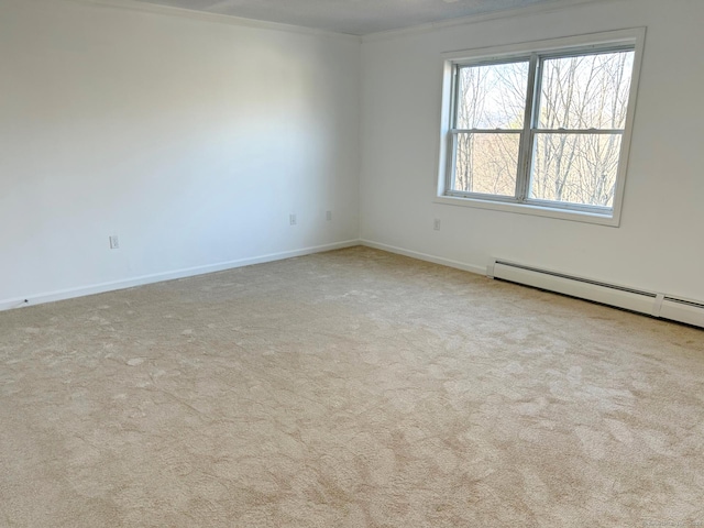 unfurnished room with light colored carpet and crown molding