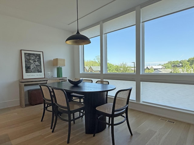 785 Post Rd E Unit 102, Westport, CT 06880 - dining room with wood finished floors and baseboards
