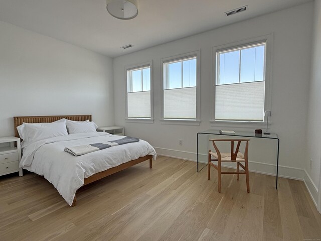 785 Post Rd E Unit 102, Westport, CT 06880 - bedroom featuring light wood-style flooring and baseboards