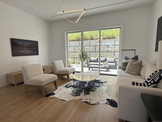 785 Post Rd E Unit 102, Westport, CT 06880 - living area featuring wood finished floors and wooden walls