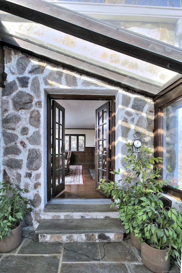 entrance to property featuring french doors