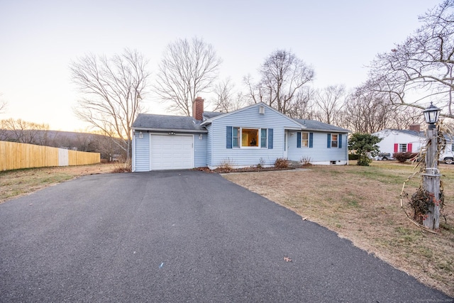 ranch-style house with a garage