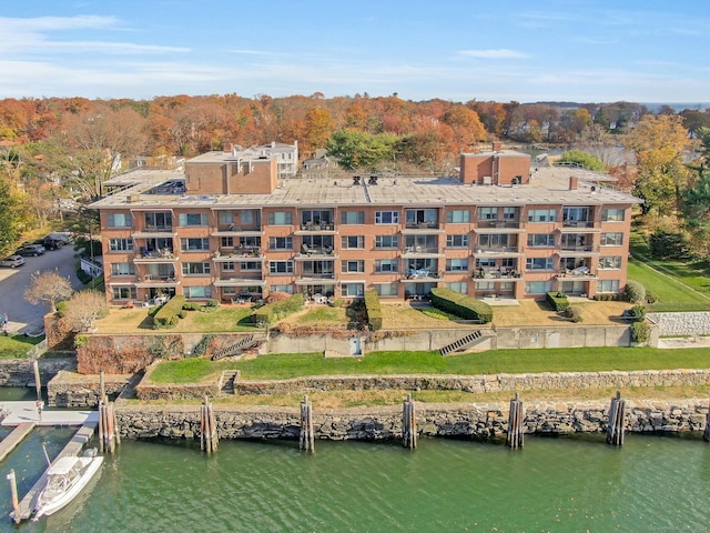 view of building exterior with a water view