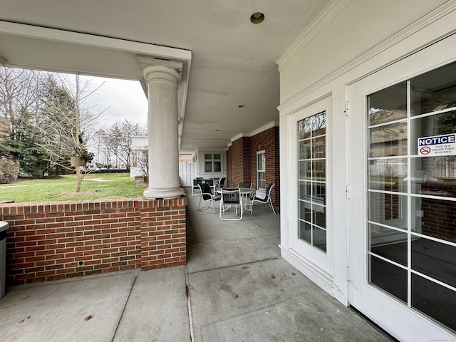 view of patio featuring a porch