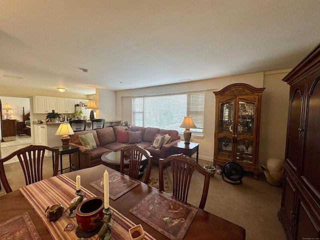 dining room featuring carpet