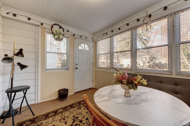 view of carpeted dining space