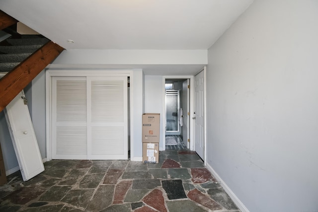 unfurnished bedroom featuring a closet