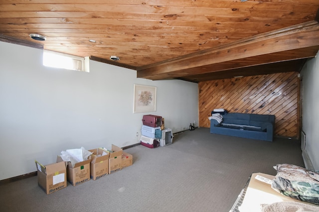 bonus room with carpet, wood ceiling, and wooden walls