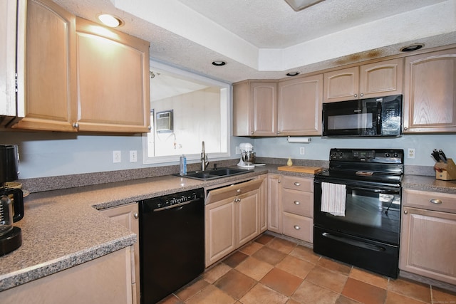 kitchen featuring sink, black appliances, a textured ceiling, and light brown cabinets