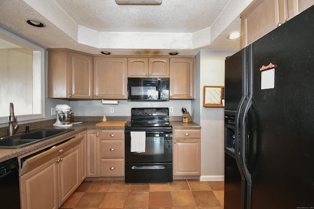 kitchen with a textured ceiling, sink, a raised ceiling, and black appliances