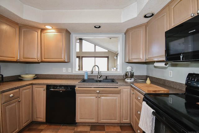 kitchen with tile patterned flooring, a textured ceiling, sink, and black appliances