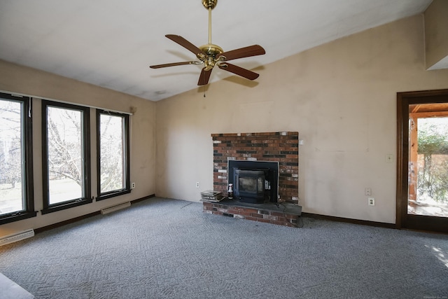 unfurnished living room with carpet flooring, ceiling fan, and a healthy amount of sunlight