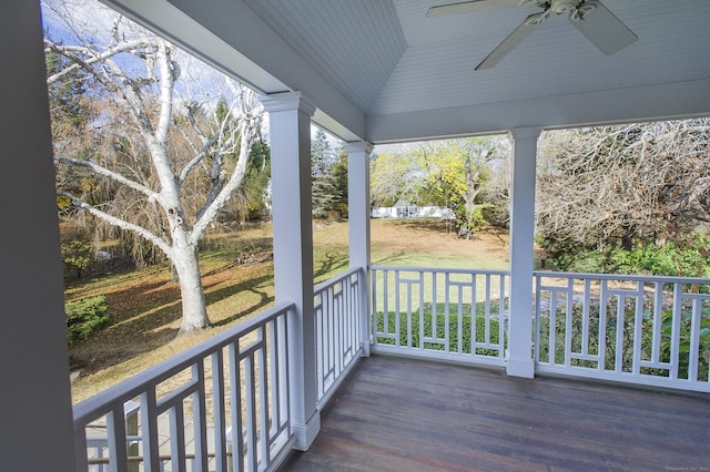 wooden terrace featuring ceiling fan